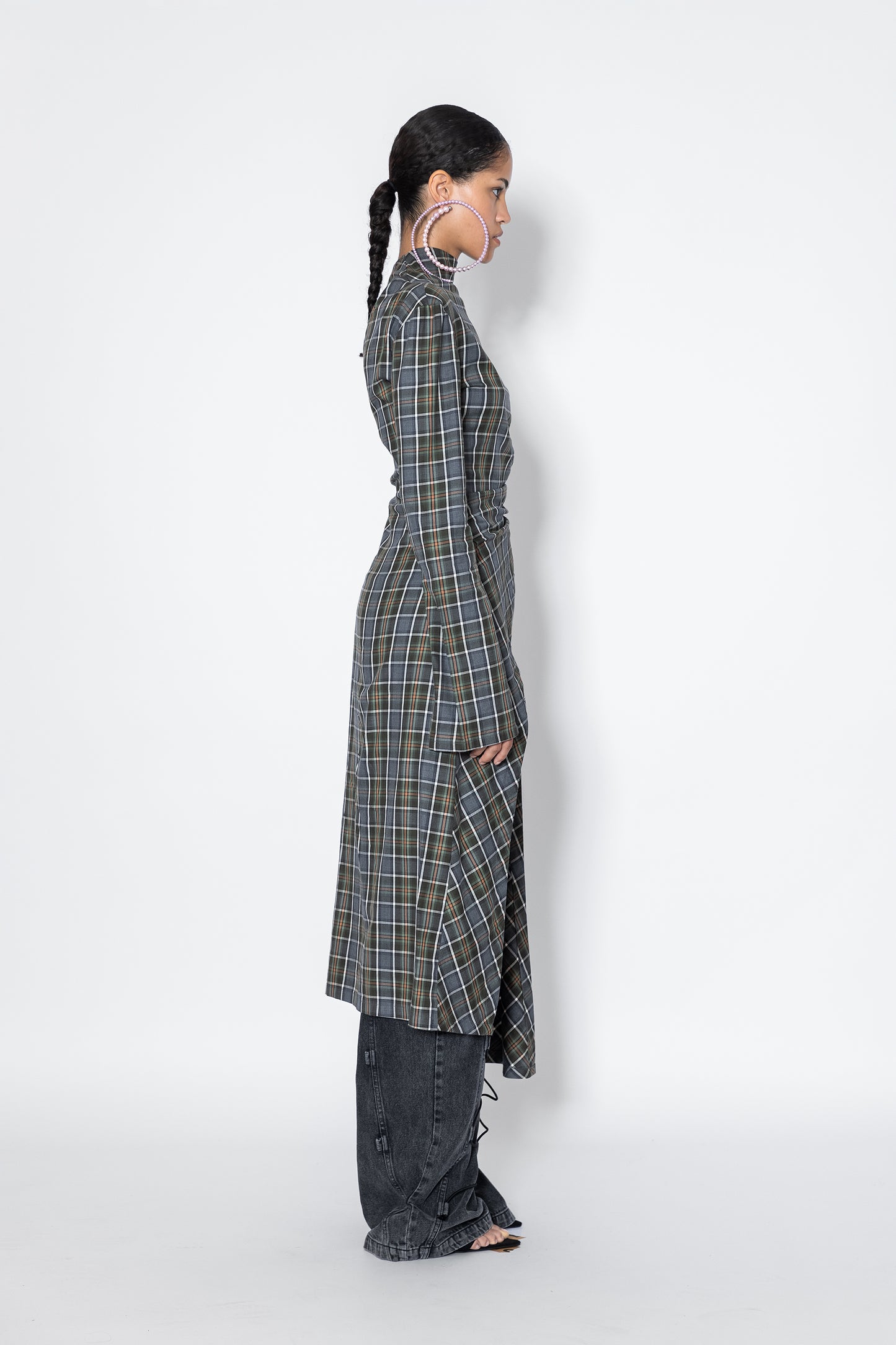 Side profile of Jade Cropper Asymmetric Plaid Midi Dress gray with draped hem asymmetric cut plaid pattern long sleeves