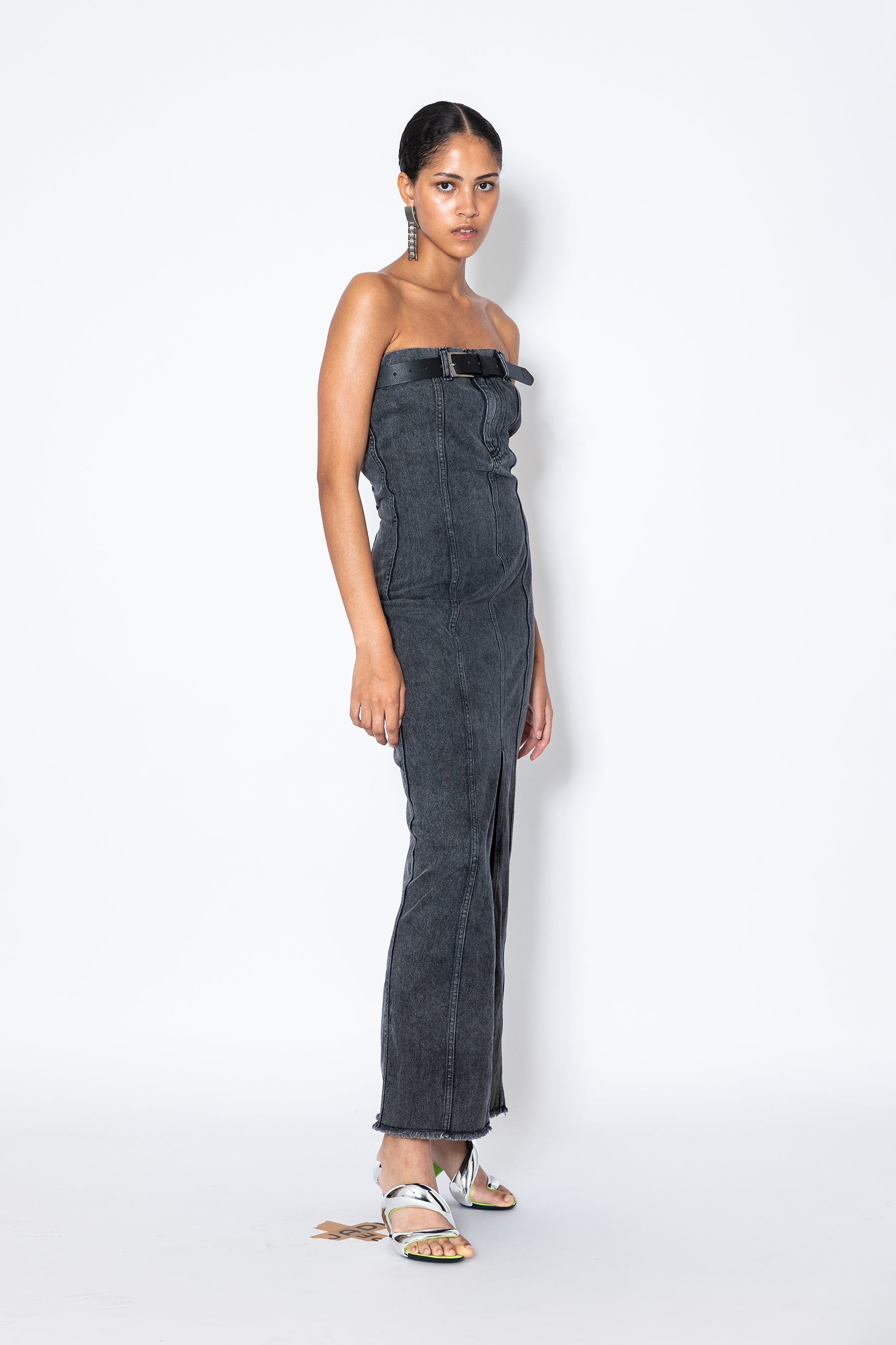 Side view of Jade Cropper strapless Denim Belt Maxi Dress fitted cut with belt detail and frayed hem in gray