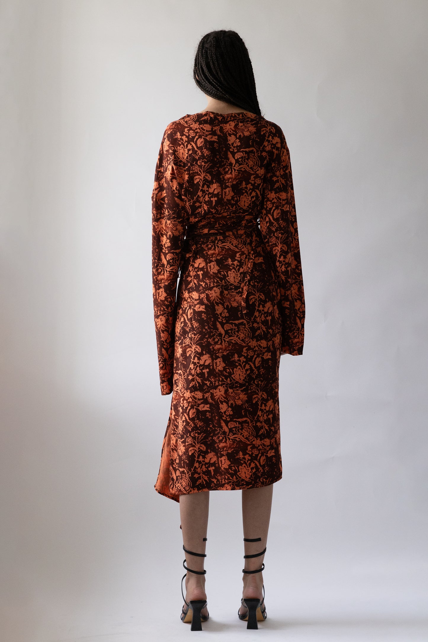 Jade Cropper product_name back view floral pattern long sleeves wrap style side split on model
