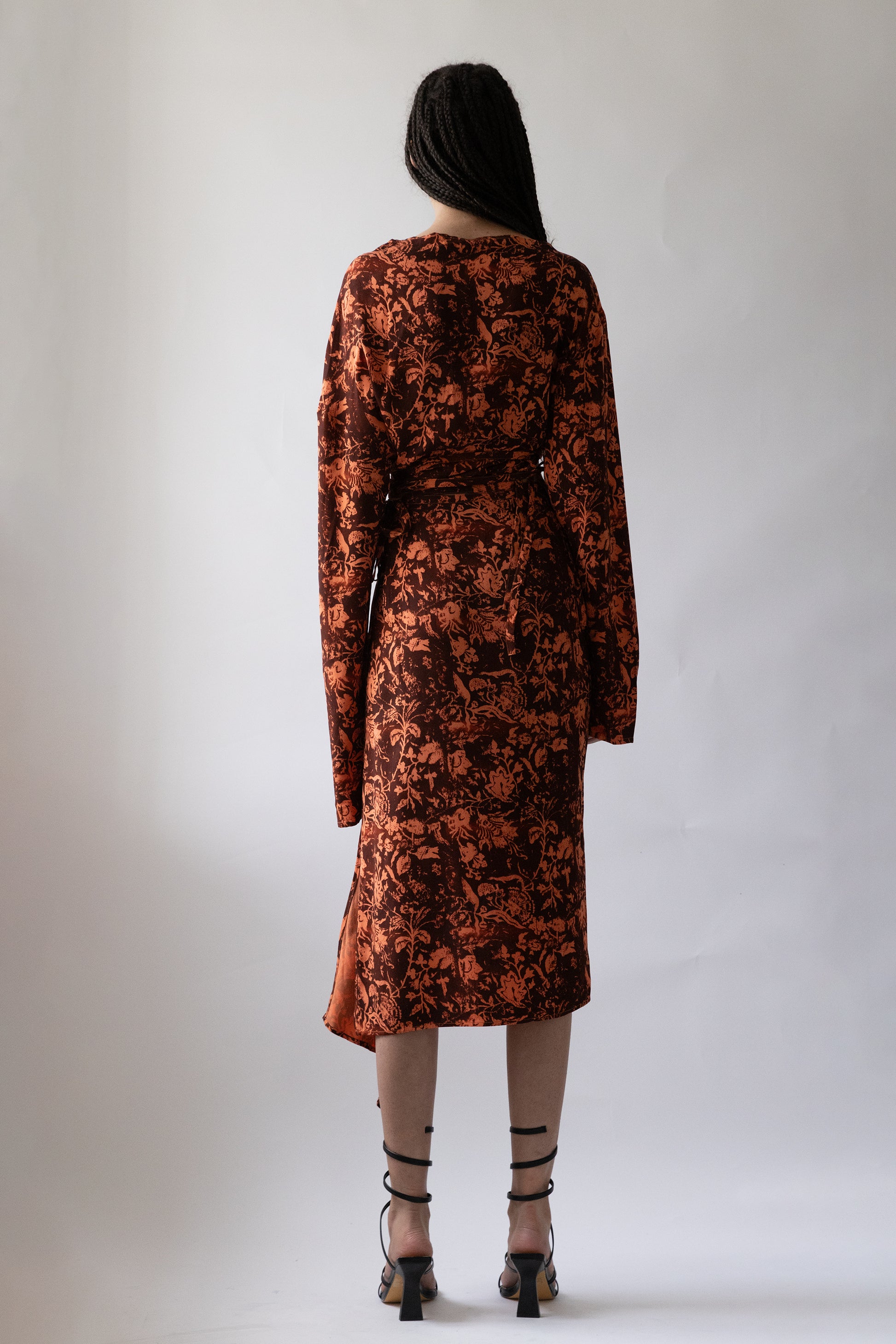 Jade Cropper product_name back view floral pattern long sleeves wrap style side split on model