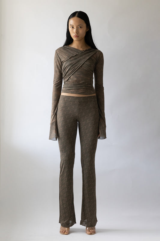 Jade Cropper wrap design sheer gray top with long sleeves front view on model