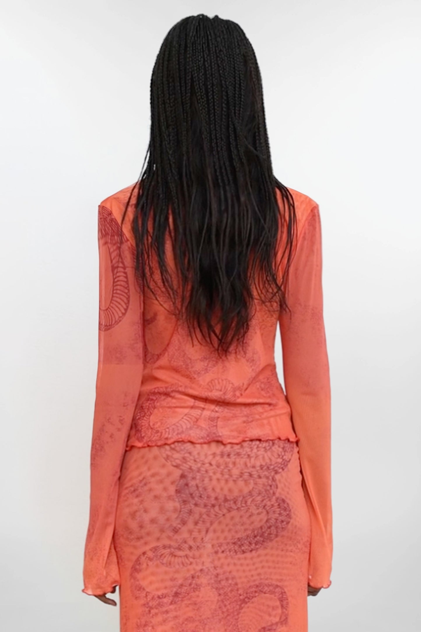 Model wears Jade Cropper Hook And Eye Cardigan rear view displaying clean silhouette and fabric fall