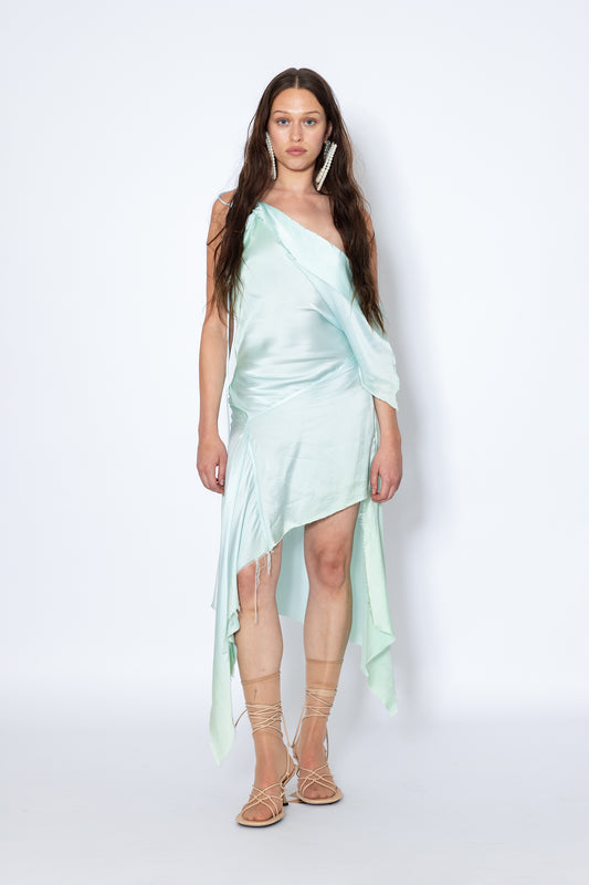 Model wears Silk asymmetric hem raw edge one-shoulder top Jade Cropper front view