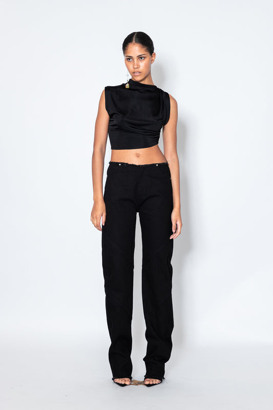 Model wears Jade Cropper Black Raw Hem Jeans front view in black with high rise wide leg and raw hem stitch detailing