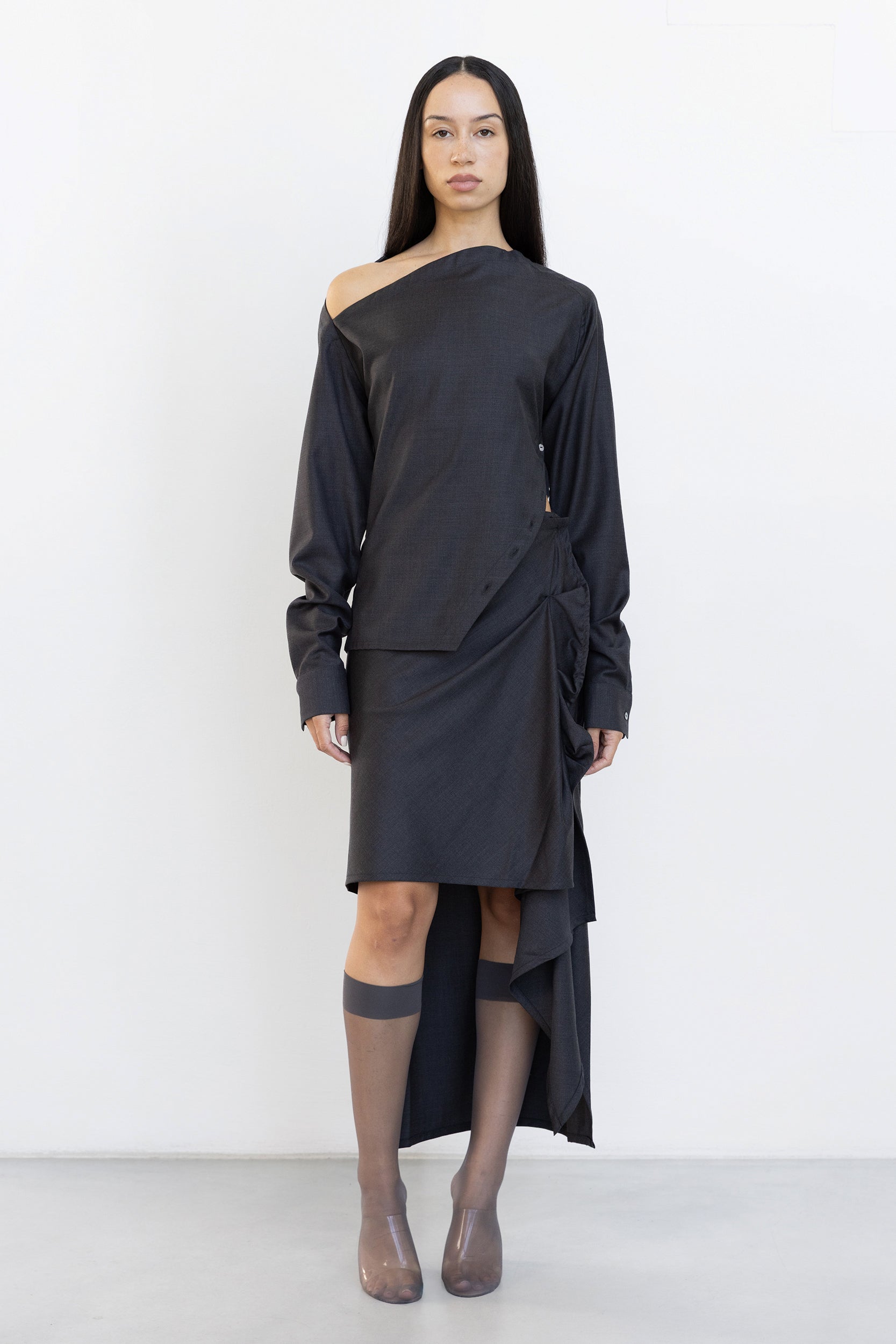 Jade Cropper gray asymmetric hem garment with draped detail and one shoulder cut button closure front view