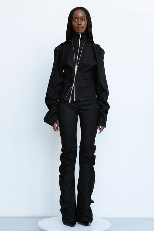 Jade Cropper black tailored fit long sleeve garment with padded shoulders and zip closure front view