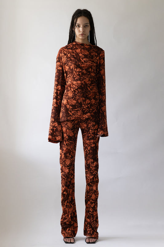 model in Jade Cropper long sleeve floral pattern high waist wide leg front view garment silhouette