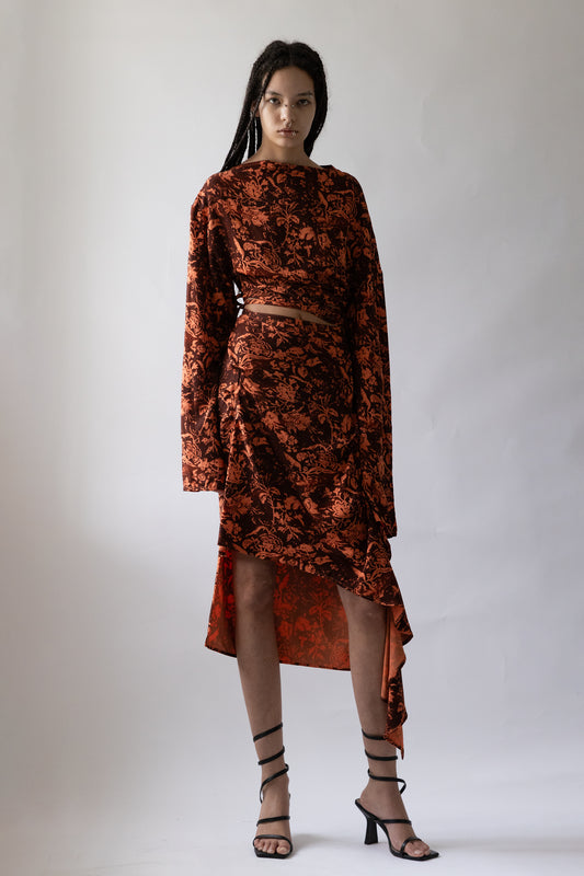 Jade Cropper product_name front view floral pattern asymmetric hem long sleeves slit detail on model