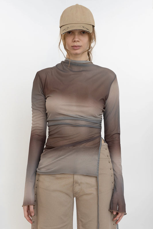 Front view of Jade Cropper Draped Top With Slit in gray with draped hem long sleeves high neckline sheer fabric
